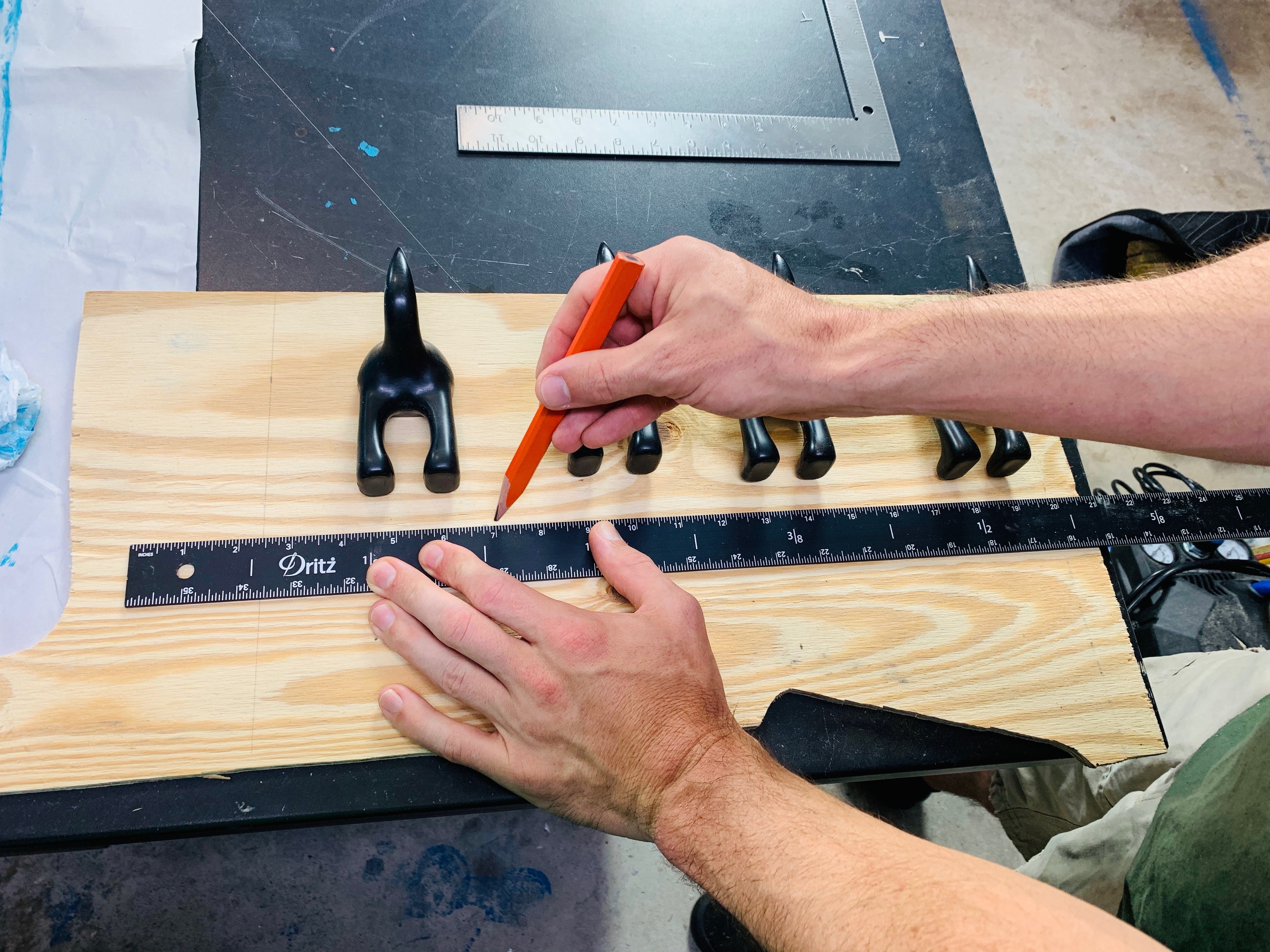 JustMightDIY-LeashHanger-CuttingWood - 2.jpg