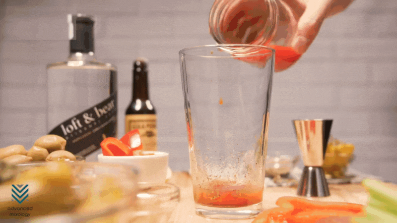 Pour tomato juice and vodka.gif