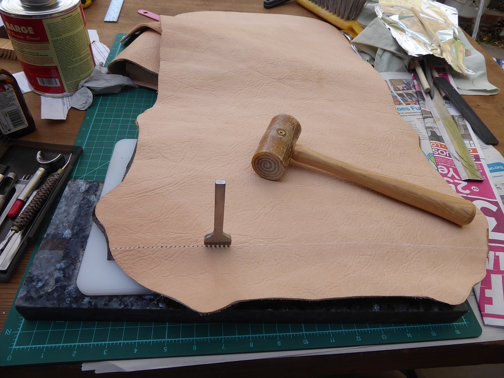 Punching holes for back pocket.jpg