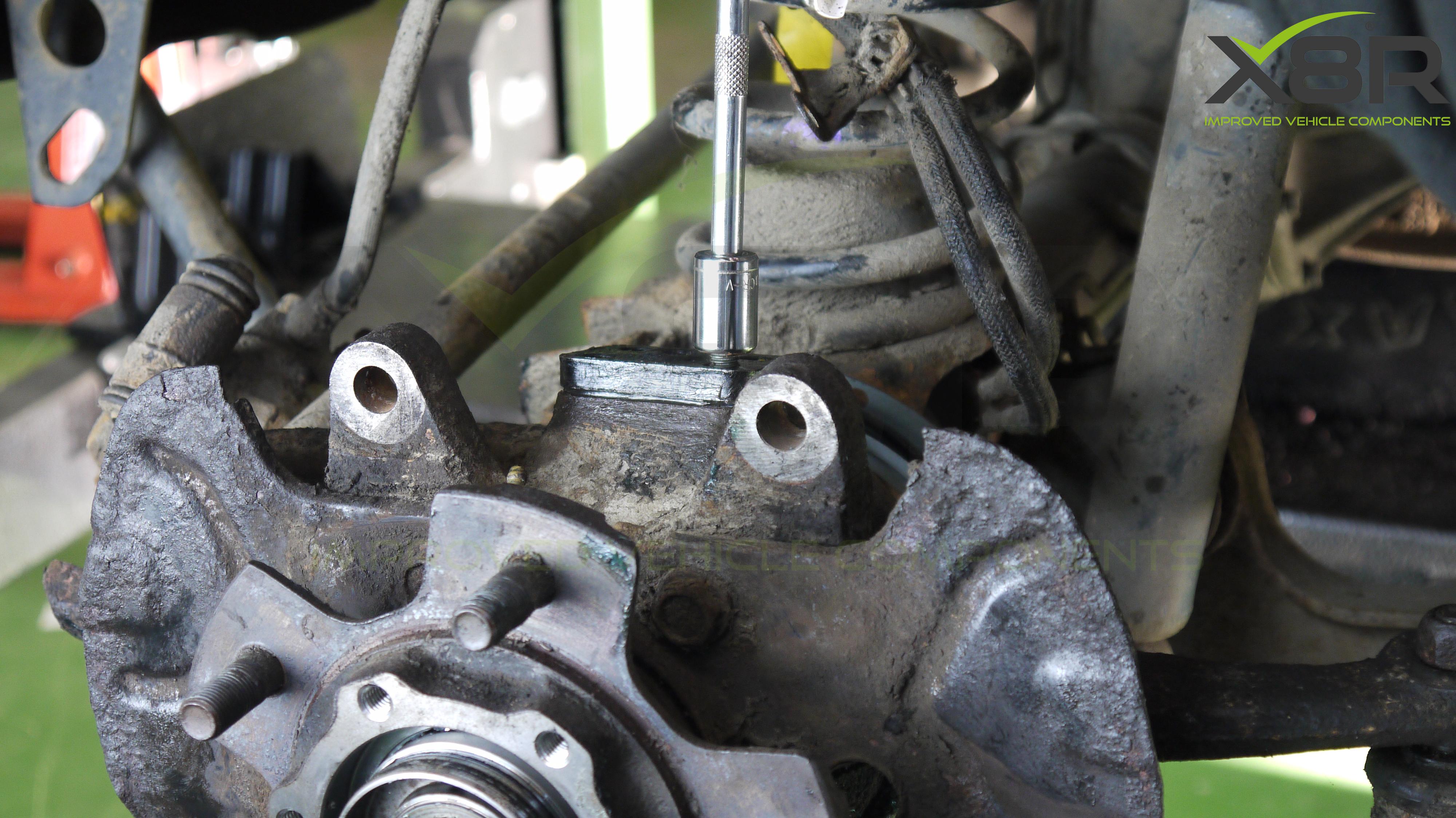 Step 6, remove kingpin bolts.jpg