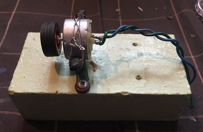 Waving Robot 06 Step 03 - Attach Motor To Board Photo 2.png