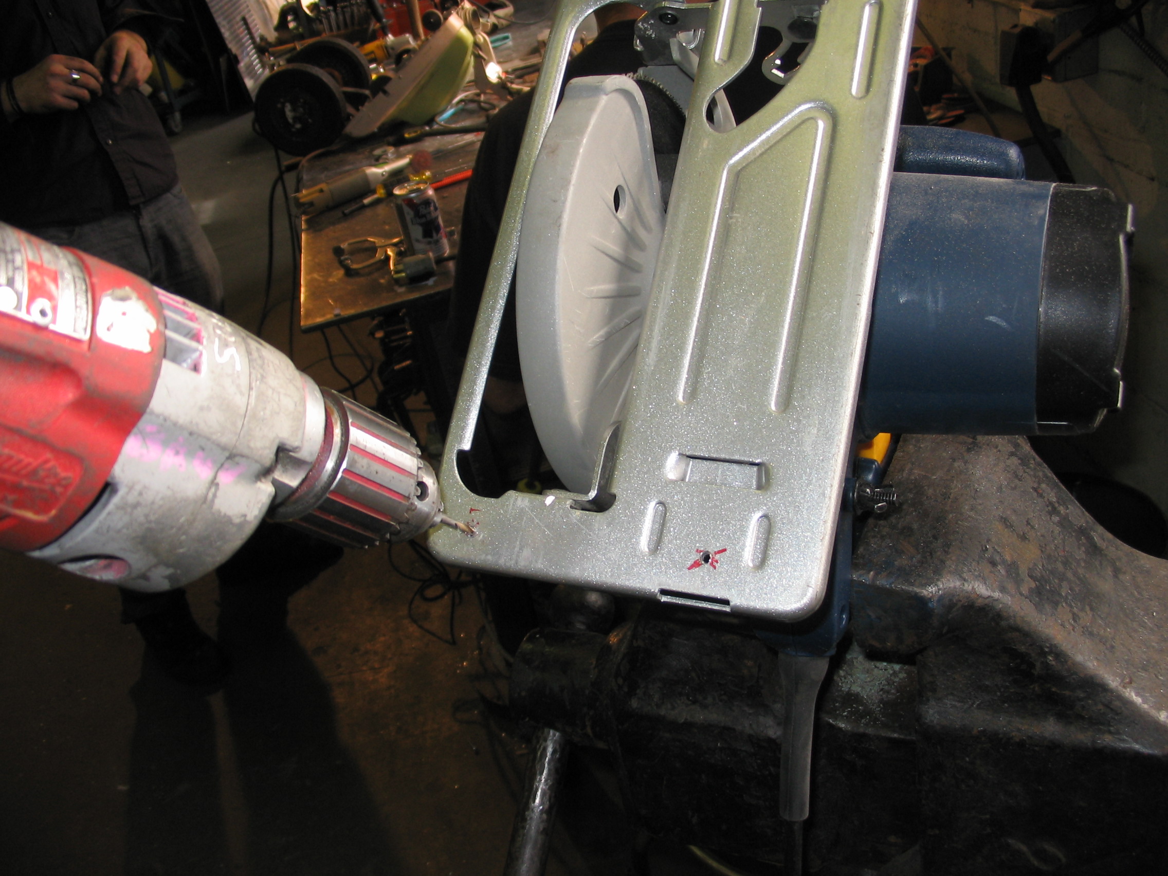 drill holes in saw deck.jpg