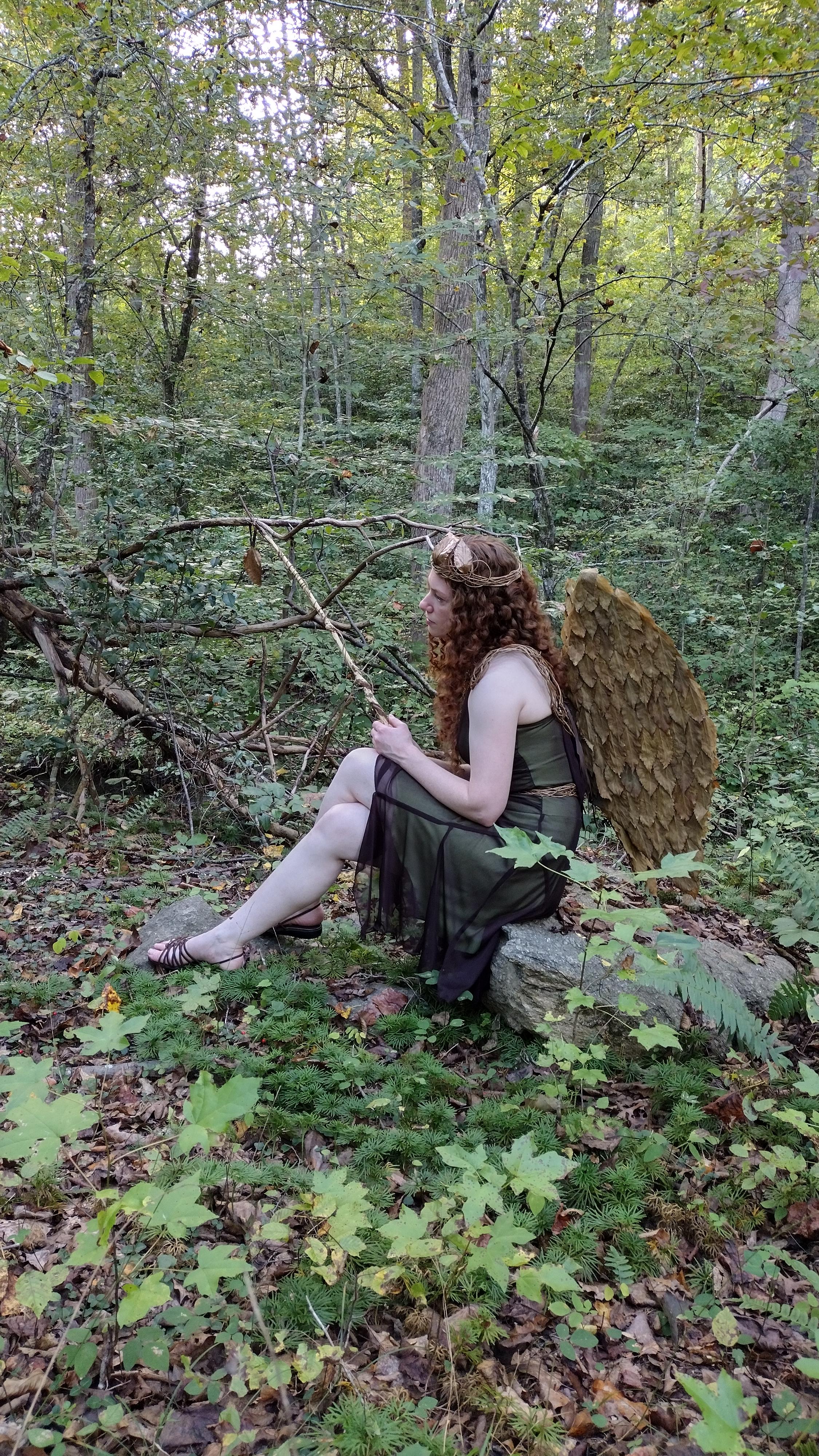 forest fairy sitting on rock.jpg