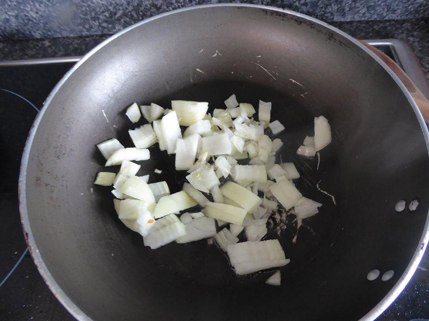 onions chopped in frying pan.JPG