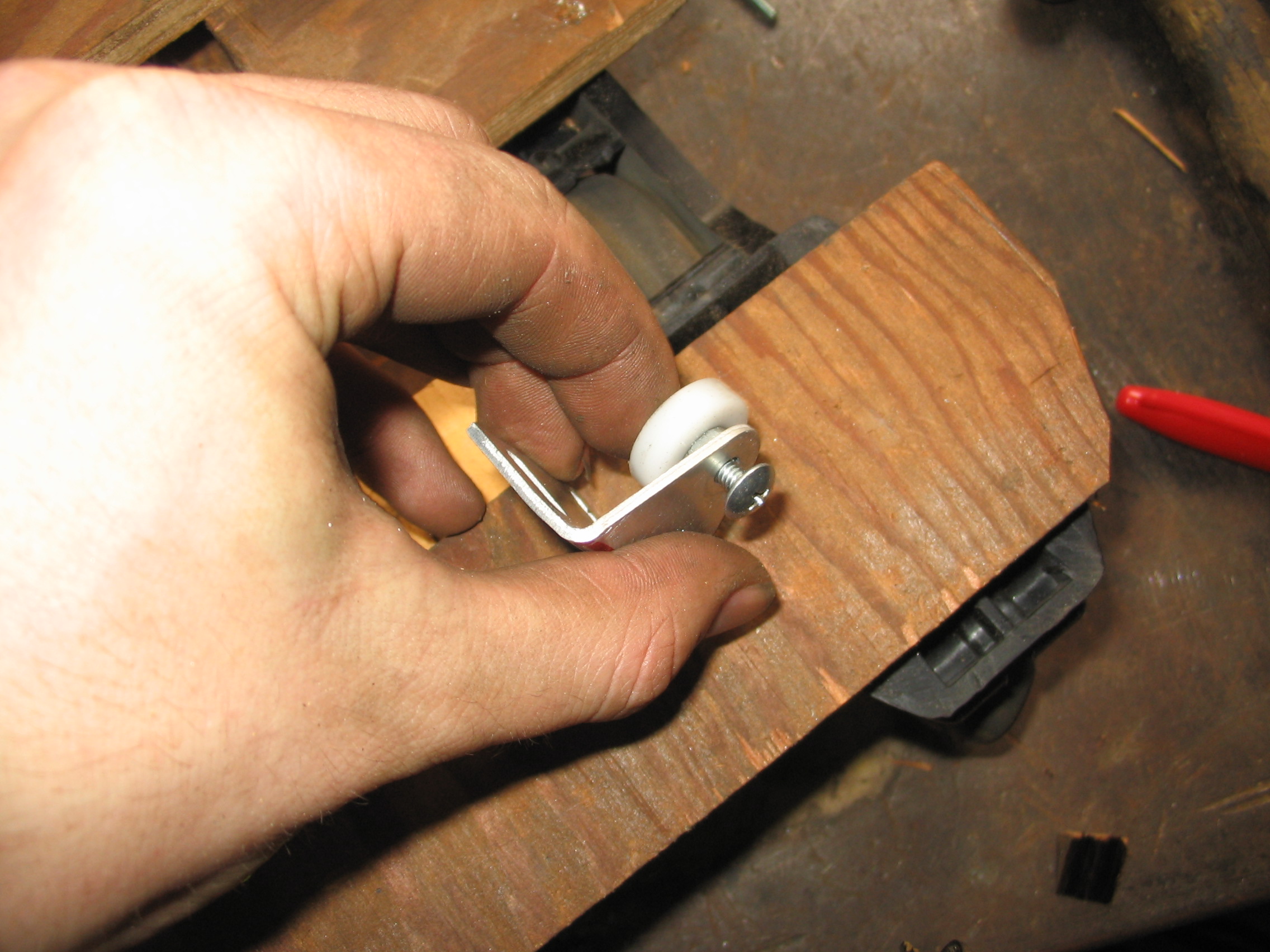 re-attach roller to bracket.jpg