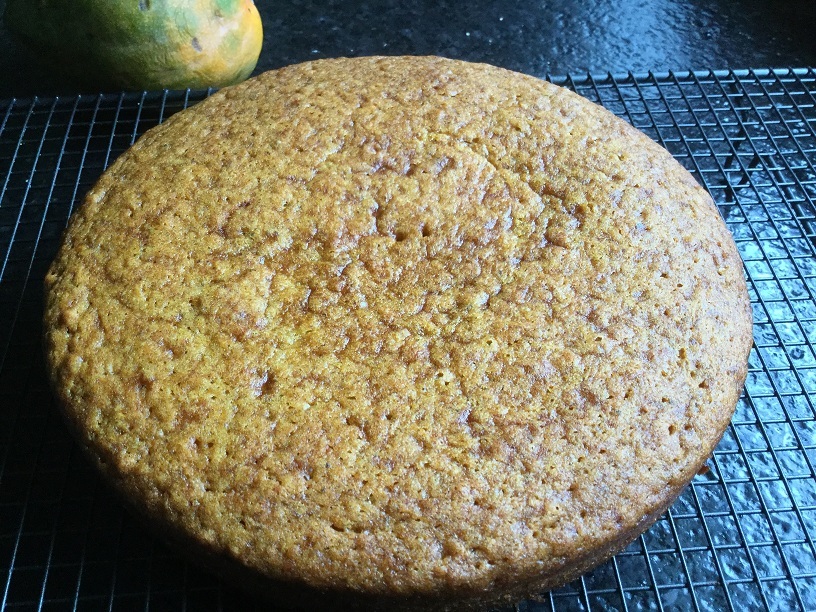vegan mango cake on wire rack.jpg