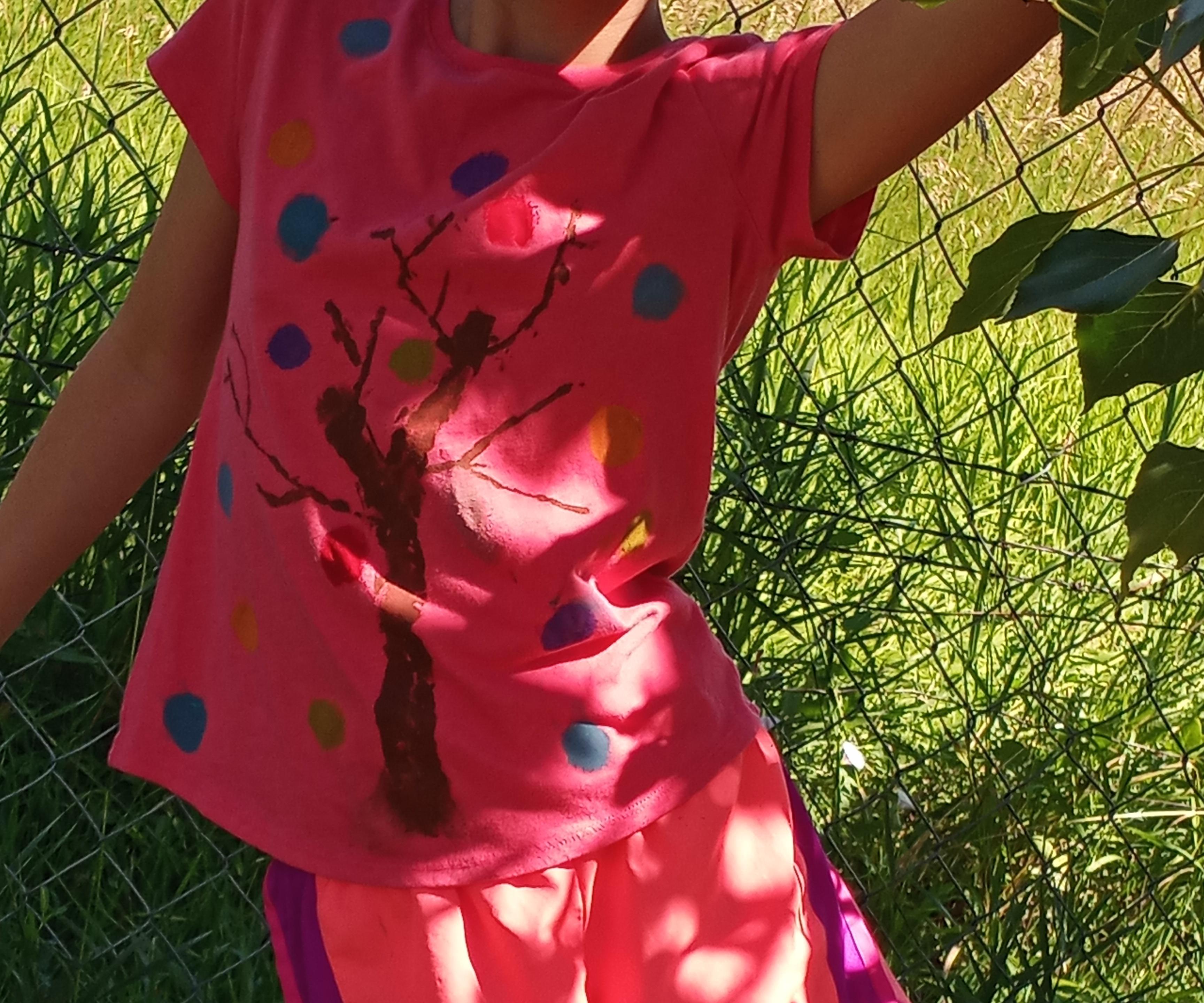 Sticks and Bouncy Balls Used to Decorate a Shirt