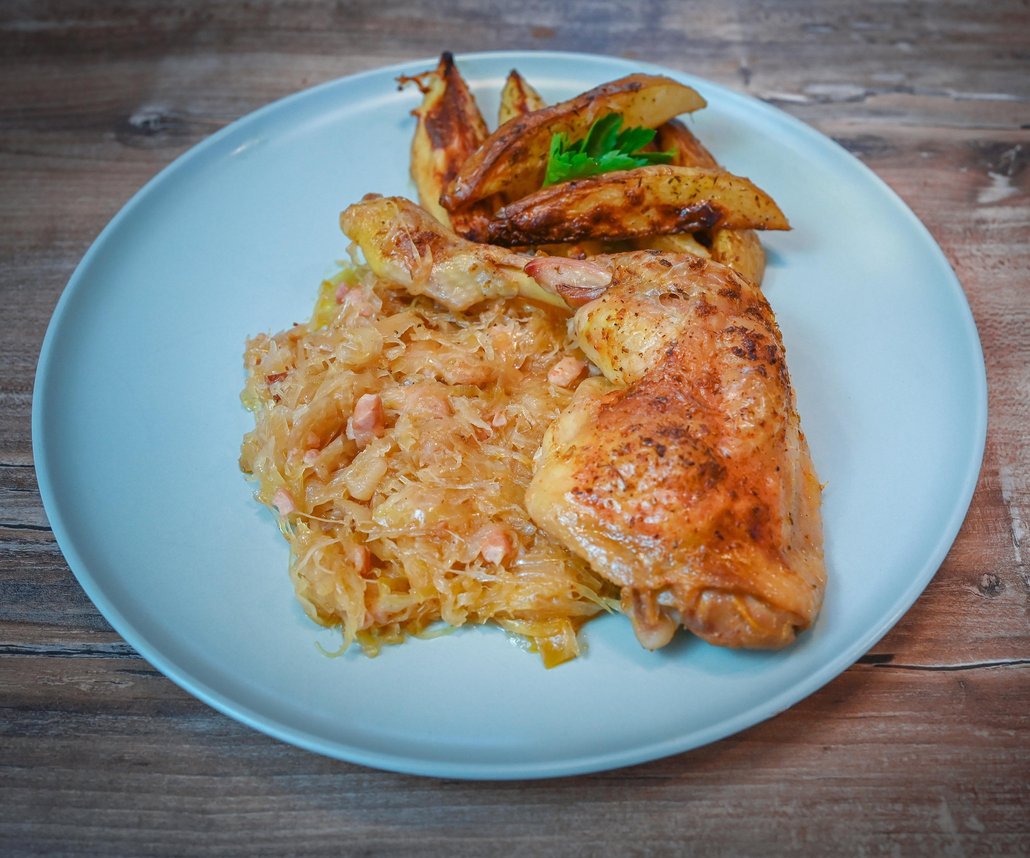 Baked Chicken Legs With Sauerkraut and Potatoes
