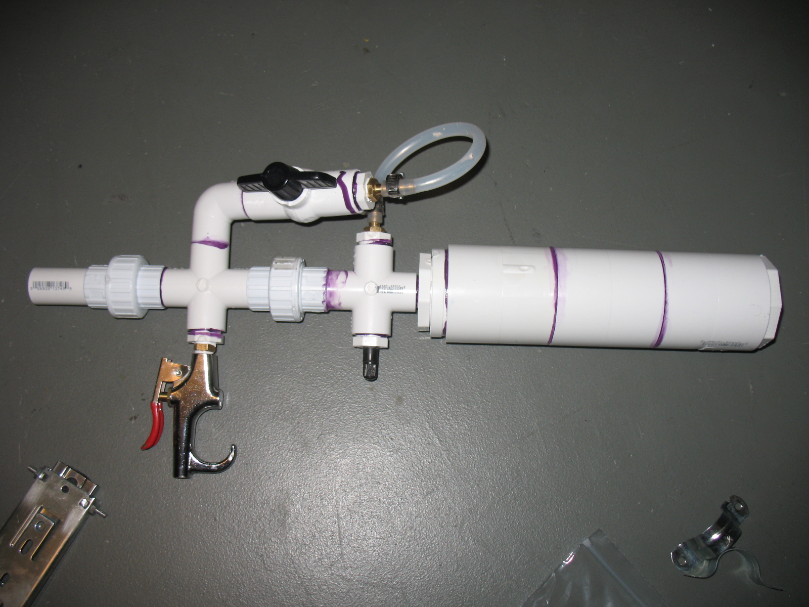 Cascade Failure Triggered Double Burst Disk Pneumatic Airgun