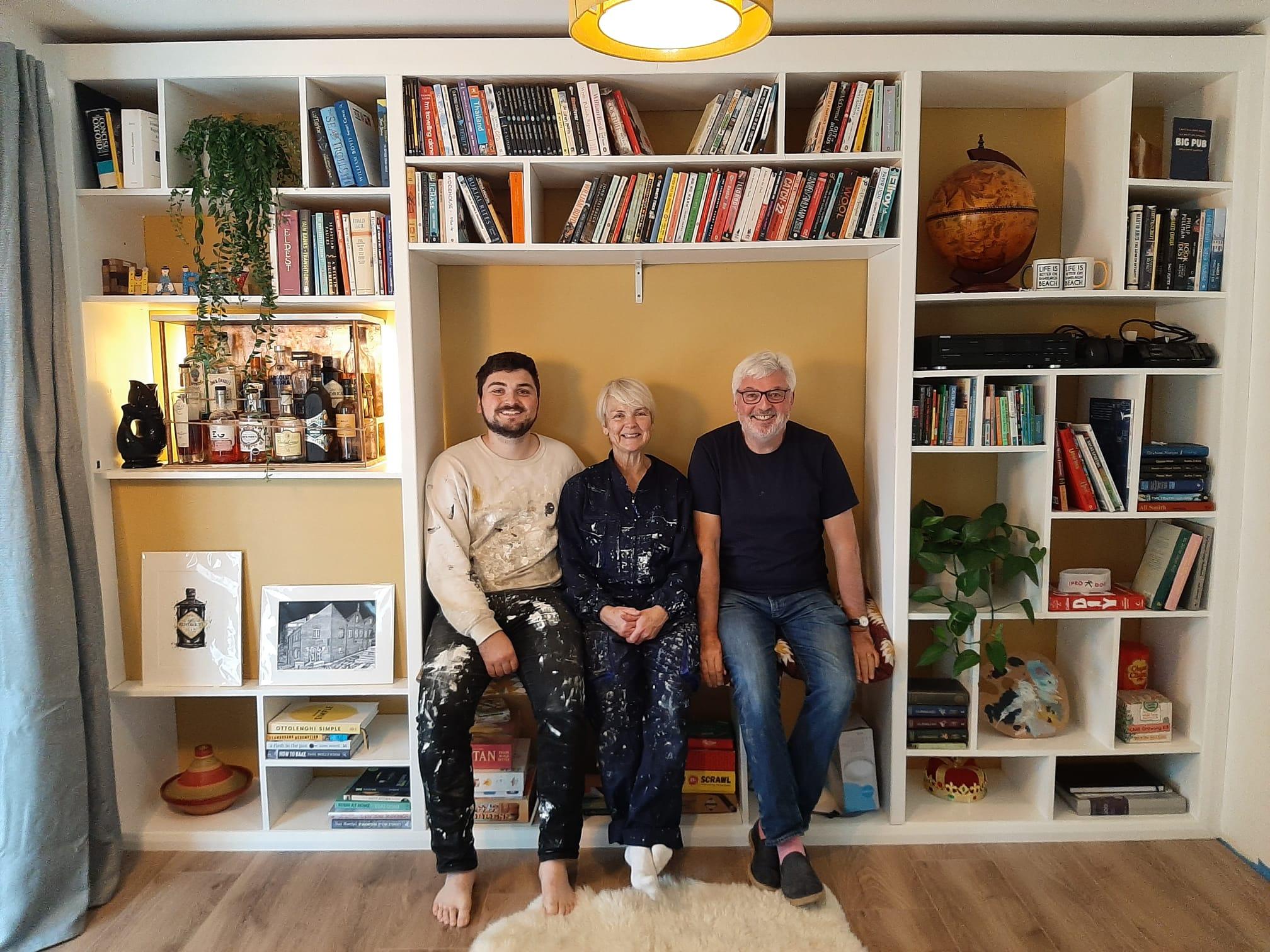 Custom Bookcase Wall With Benchseat and Hidden Bar