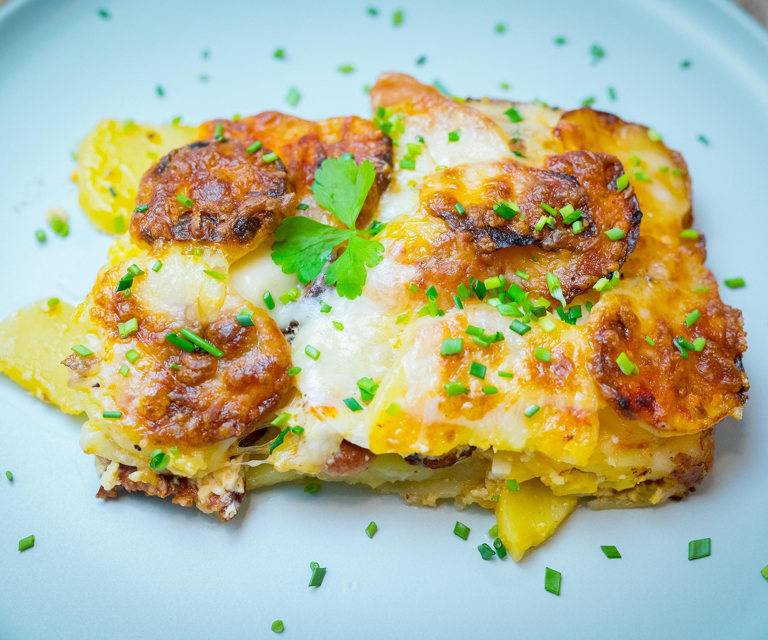 Loaded Potato Casserole With Bacon, Sausages and Kielbasa.