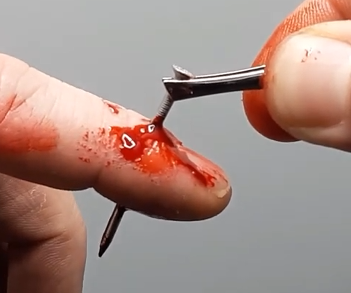 Nail Through Finger Prank