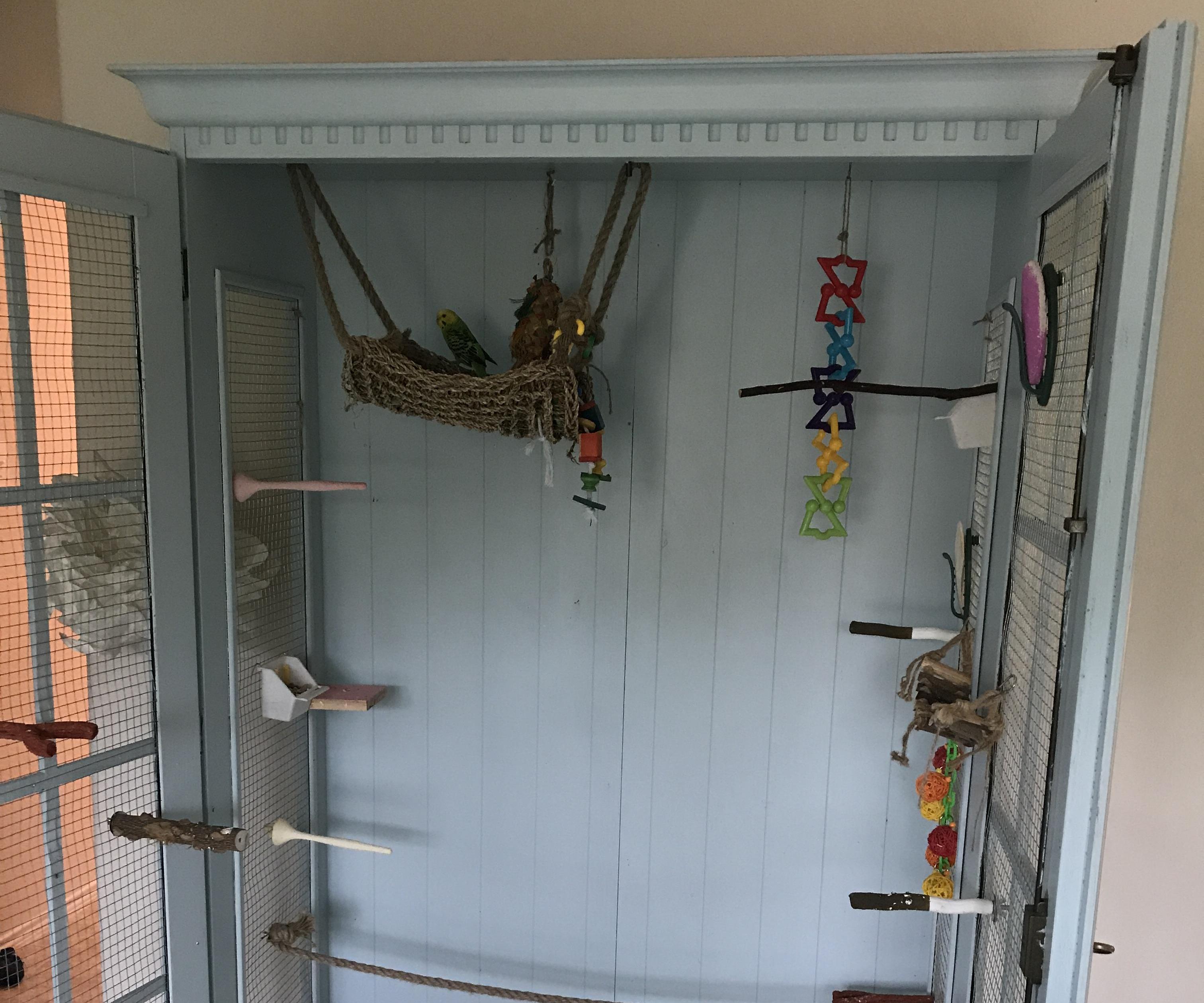 Turn a China Cabinet Into a Deluxe Bird Cage