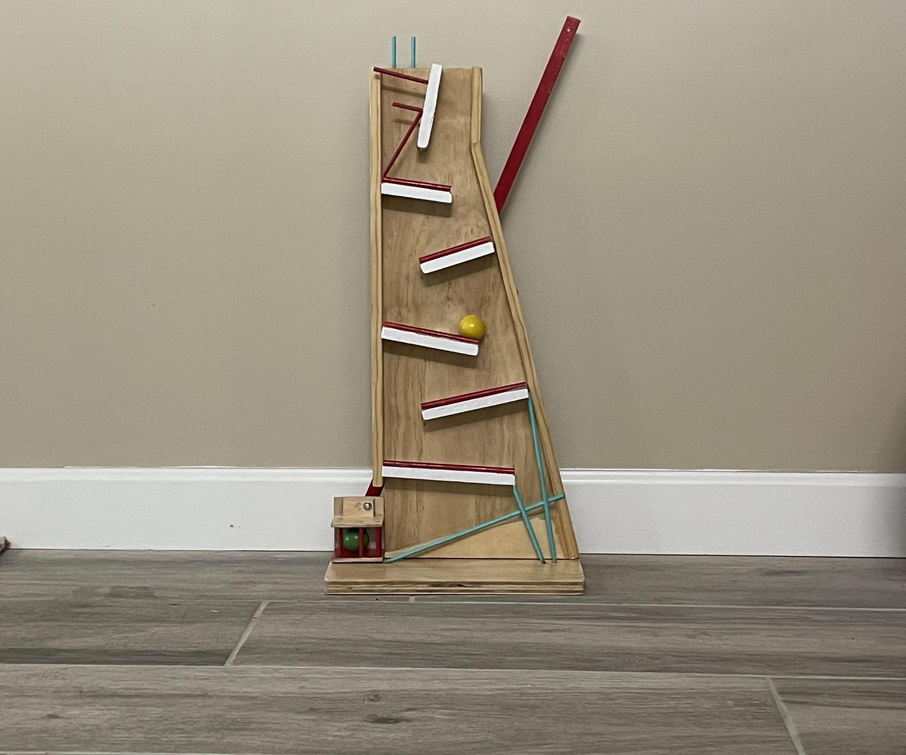 ROLLING BALL TRACK WITH BALL ELEVATOR 