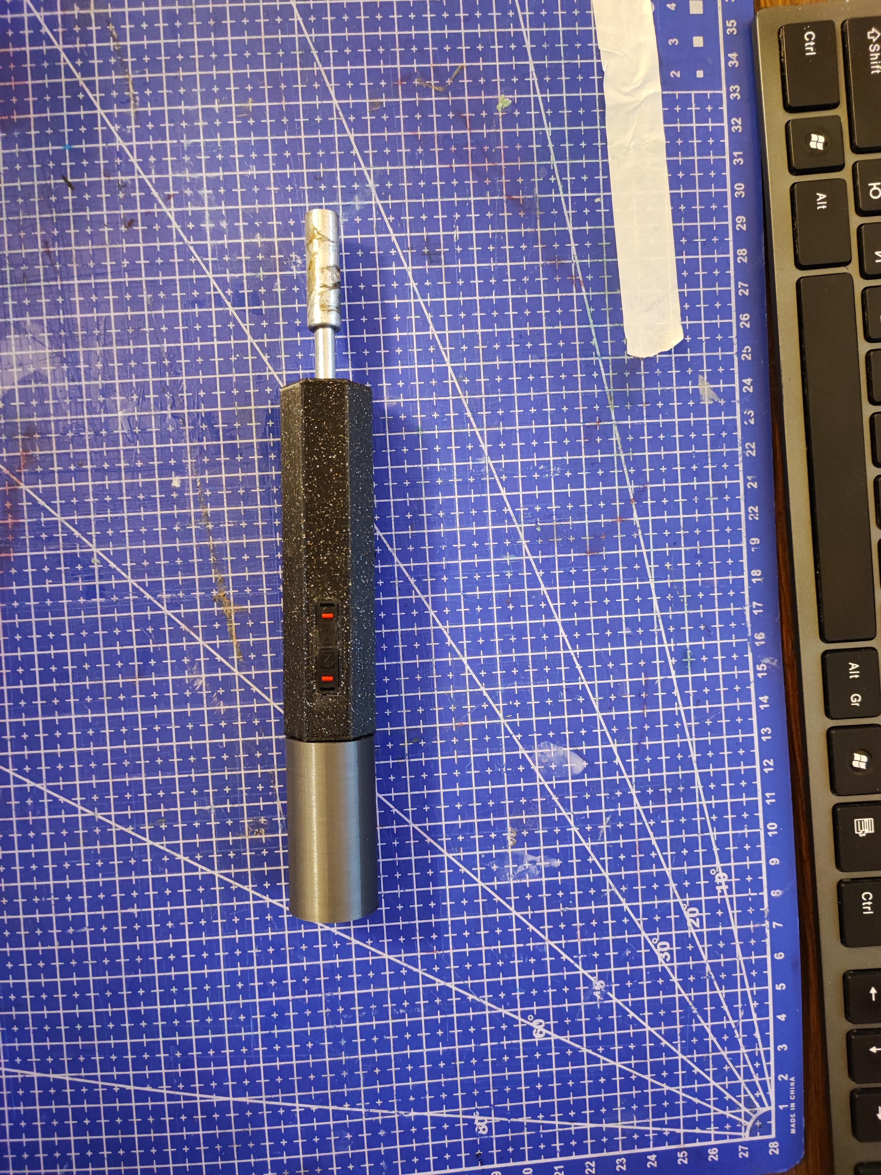 Small electric screwdriver.