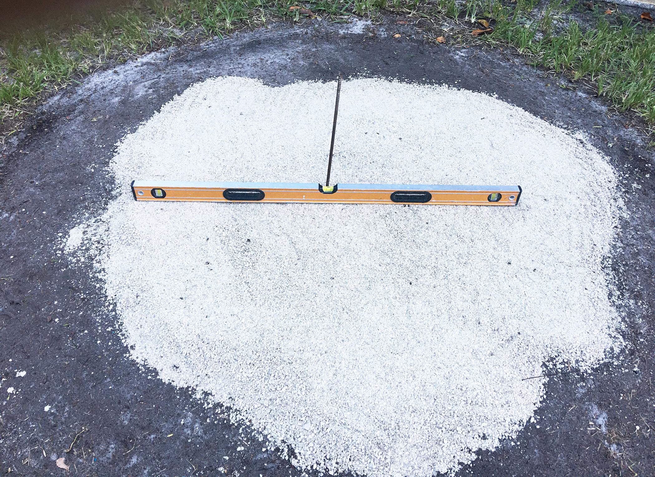 #3 Putting down the pavers gravel.jpg