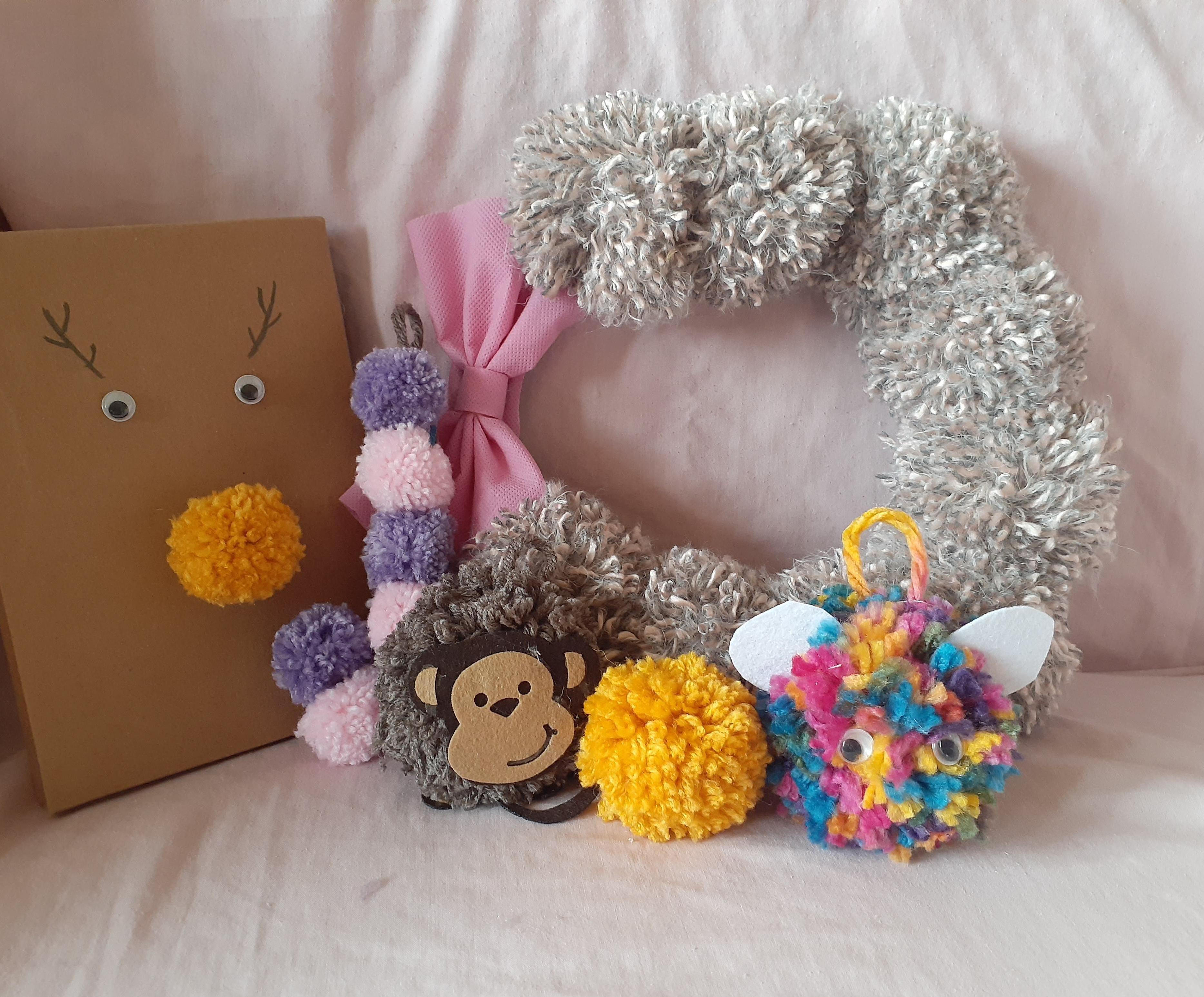 pom pom wreath , ornaments and giftwrap 