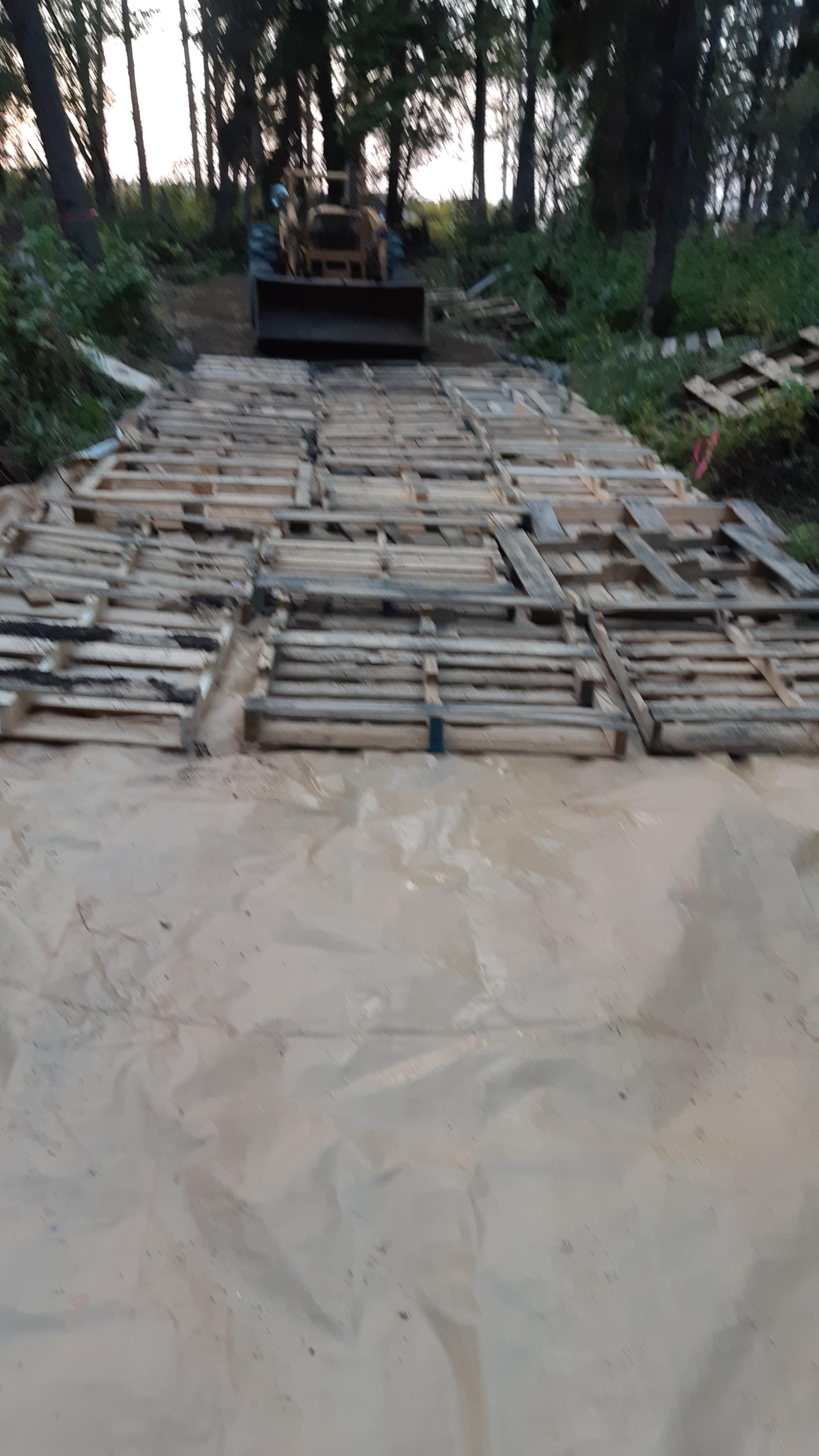Inexpensive Pallet Road and Parking Area in Muskeg