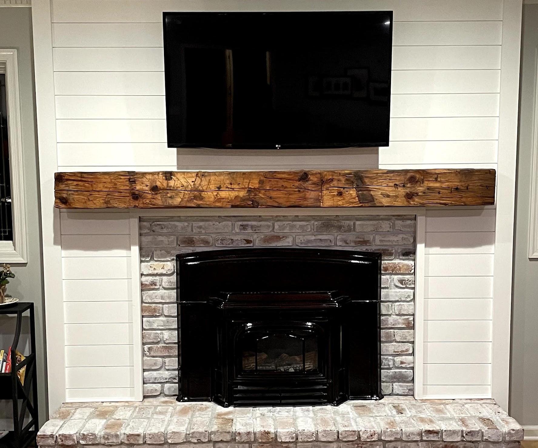 Shiplap Fireplace With Natural Beam Mantle