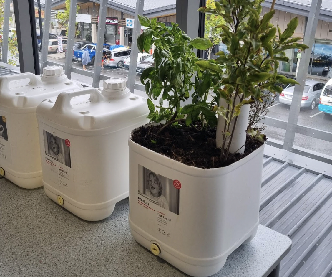 How to Make a Self Watering Planter Box Out of a Dish Wash Liquid Tub.
