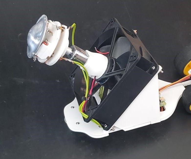 The Cotton Candy Enigma: Exploring Material Deposition Through Miniature Mobile Robots and Augmented Reality