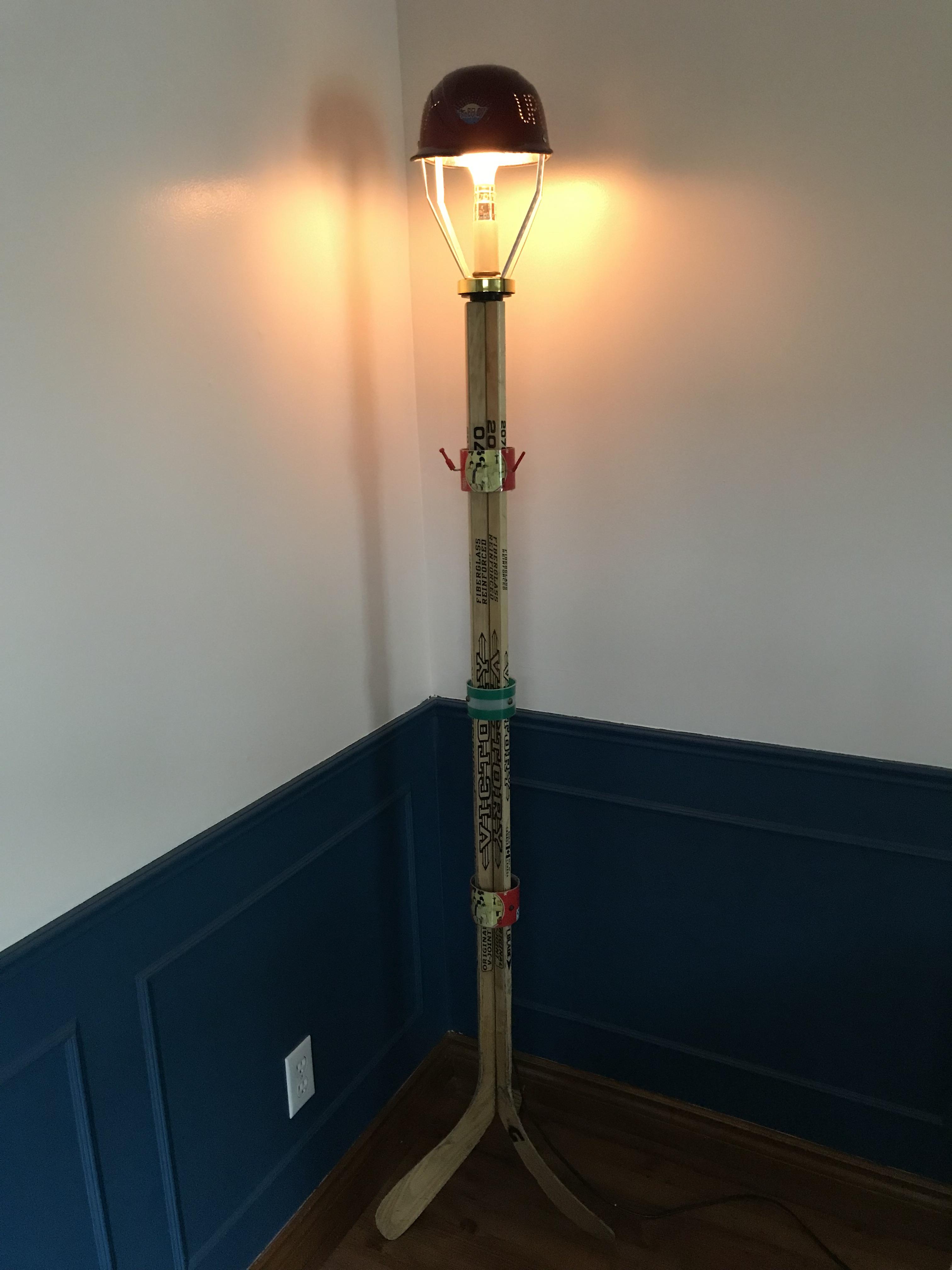 A Floor Lamp Made From Household Trash
