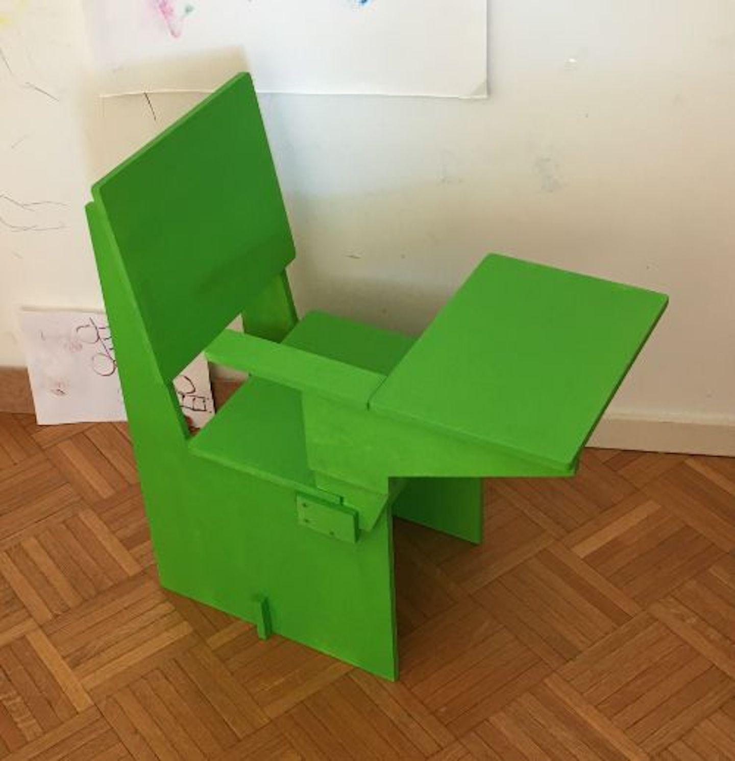 A Kids Chair With Writing Pad