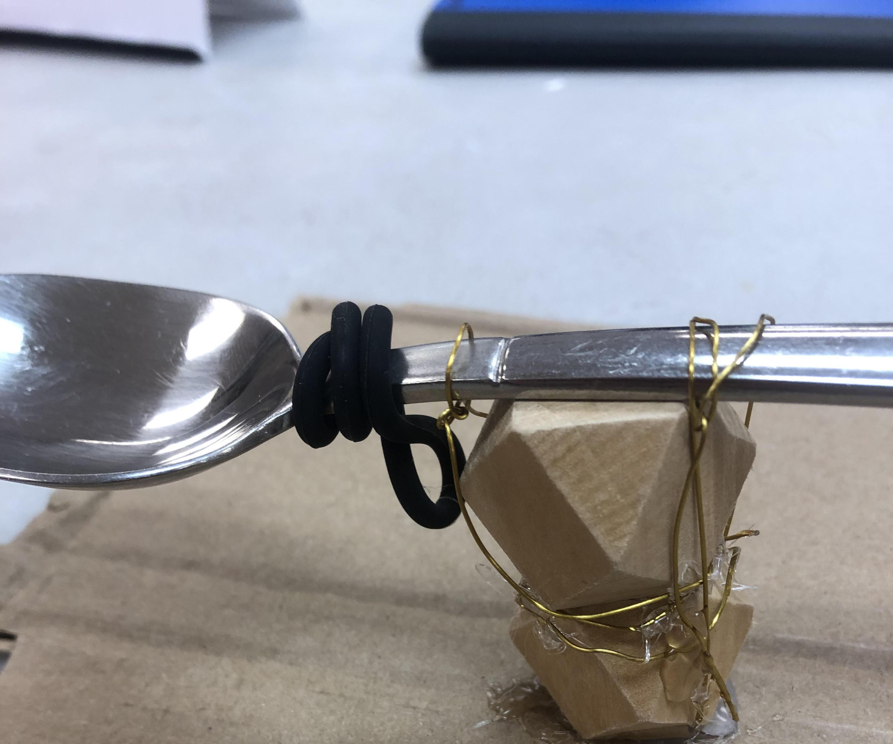 A Catapult That Launches Marshmallows Into Your Drink 